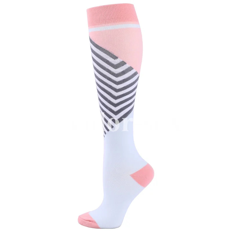 A pair of medical grade compression socks with pink and white stripes.