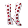 Mid-calf socks with a repeating pattern of red lips on a white background