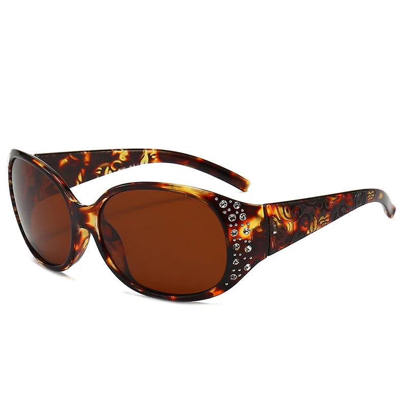 Brown tortoiseshell sunglasses with diamond and crystal embellishments