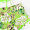 A bright lime green floral print two-piece high-waist bikini set with tropical leaves.