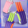 A set of colorful carrot-shaped fidget toys for stress relief, shown in various shades of orange, pink, and purple.