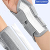 A hand wearing a gray soft plastic wrist support brace designed for joint pain relief.