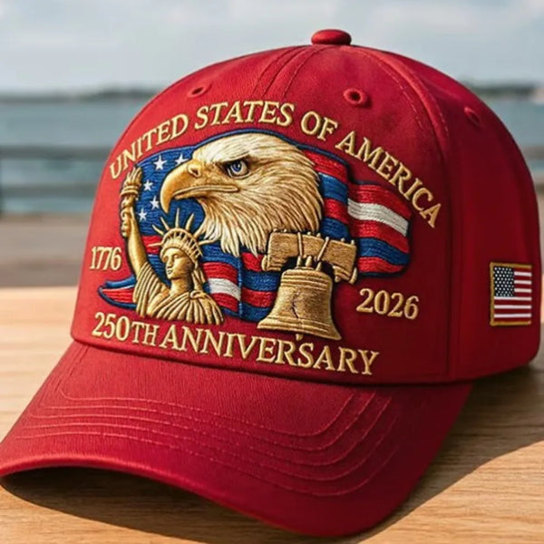 A red baseball cap featuring a graphic of the bald eagle and text celebrating the United States of America's 250th anniversar