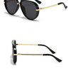 Black fashion protective sunglasses with gold-toned arms and temples.