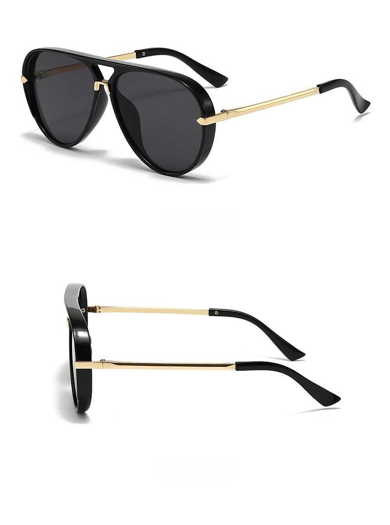 Black fashion protective sunglasses with gold-toned arms and temples.