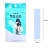 A package of clear double-sided fashion tape for clothing with a graphic featuring a person taking a photo.