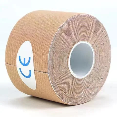 Roll of tan kinesiology tape with a CE mark visible