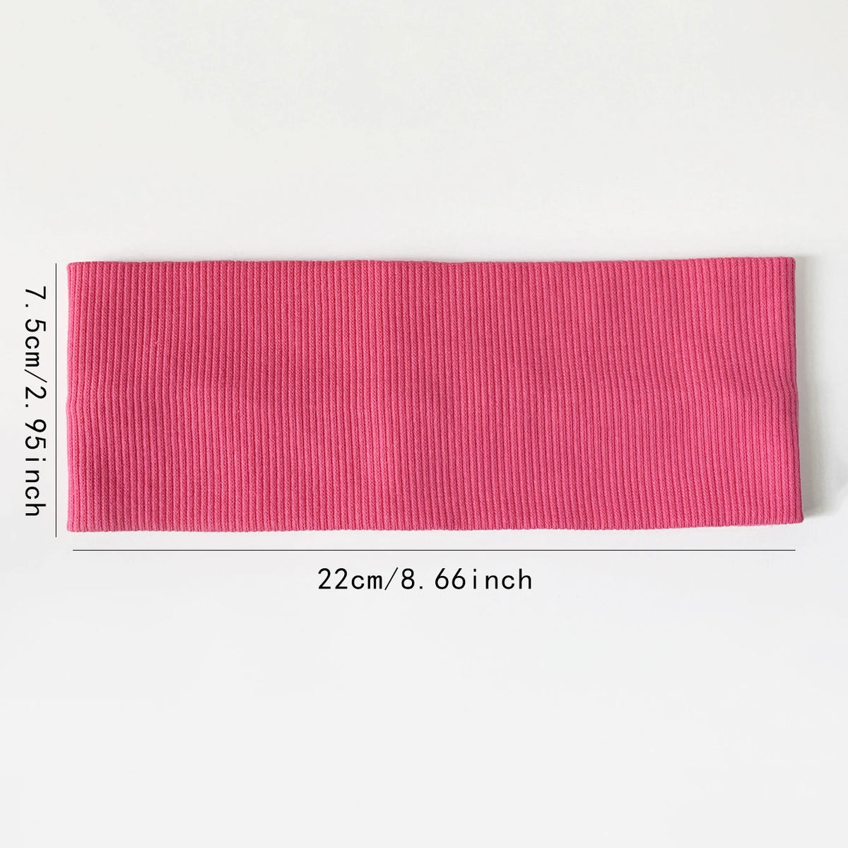 A pink elastic hairband is shown, measuring 7.5 cm or 2.95 inches long and 22 cm or 8.66 inches wide.