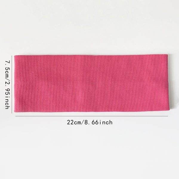 Goma elástica rosa para el cabello, mide 7.5 cm de largo y 22 cm de ancho.