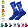 A collection of blue and yellow anti-slip performance sports socks in various styles and colors.