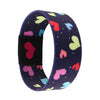 A dark blue stretch wristband bracelet patterned with colorful hearts.