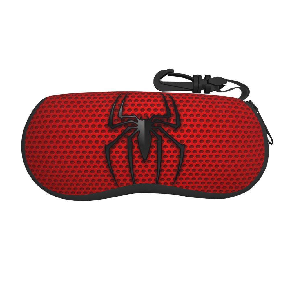 A black pouch with a red background featuring a silver spider web design.
