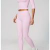 A woman models a pink women's yoga and fitness leggings set in three different styles.