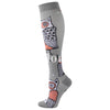 Gray compression socks featuring repeating owl designs in orange and black.