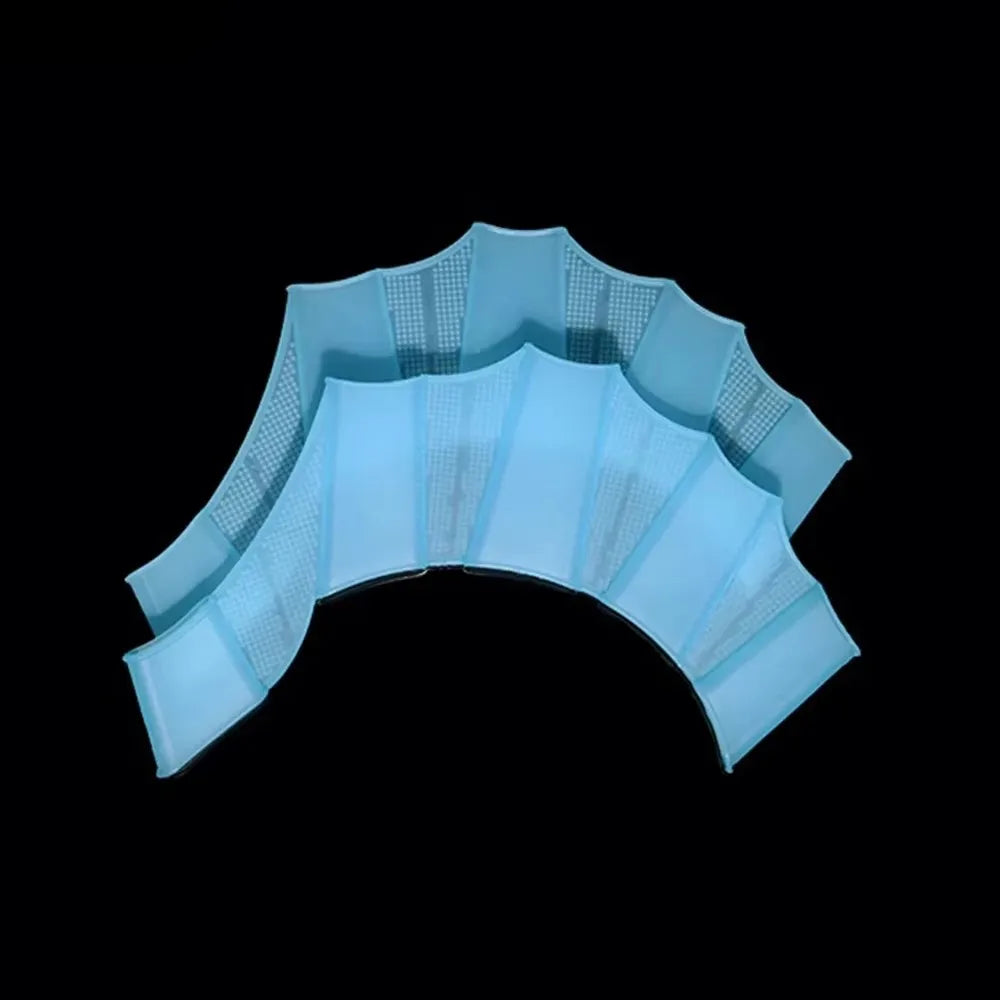 Light blue silicone swim training flippers displayed against a black background.