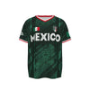 Dunkelgrünes Fußballtrikot mit weißem Rand und dem Wort MEXICO auf der Brust.