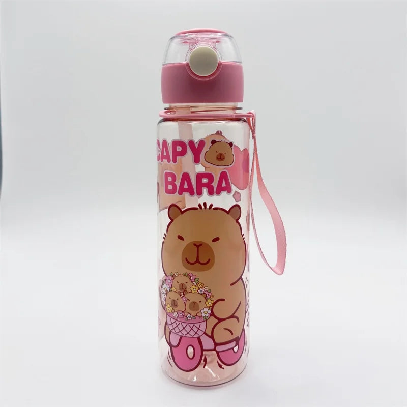 A pink and clear insulated water bottle featuring a bear design with a honey pot, topped with a pink lid.