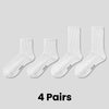 Four pairs of white breathable sports performance socks laid out flat.