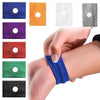A collection of various colored anti-nausea wristbands shown on a hand and arm.