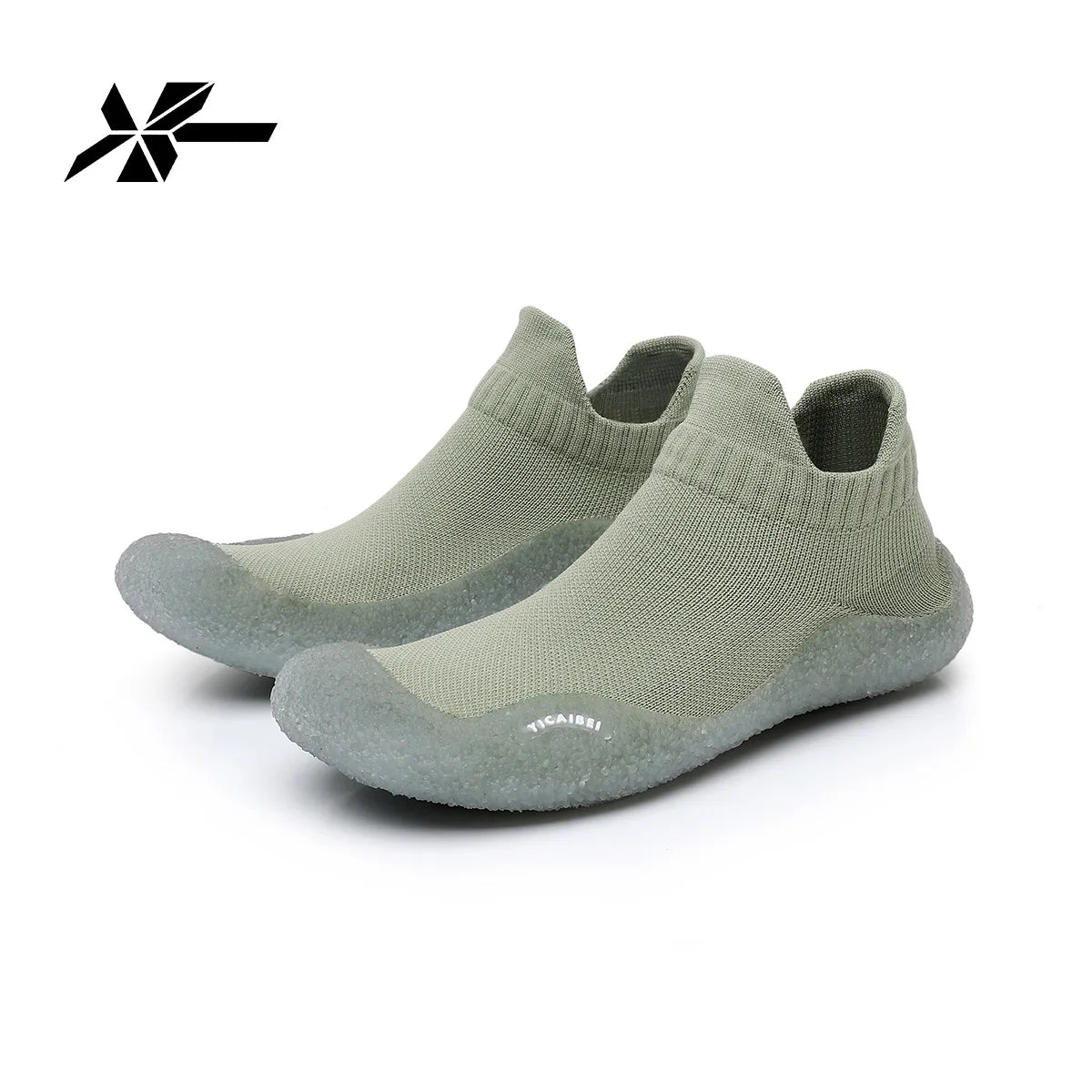 A pair of olive green summer quick-dry slip-on shoes shown from the side.