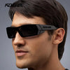 A man wearing black KDEAM polarized sports sunglasses against a gray background.