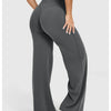 A model is wearing dark gray high waisted wide leg yoga pants.