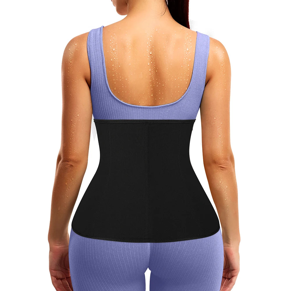 A woman wearing a purple body shaping waist trainer corset with black fabric and matching purple leggings.