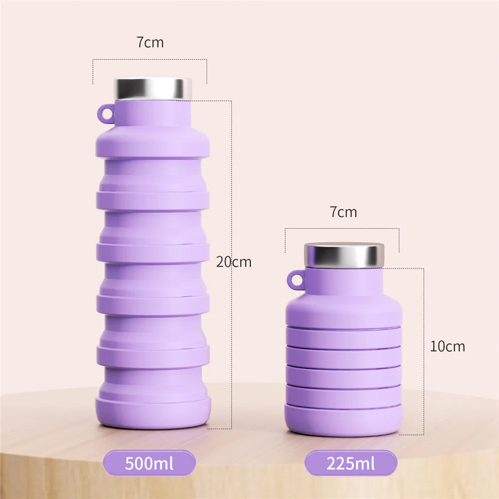 A purple collapsible silicone travel water bottle shown next to a measuring scale.