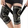 Black copper knee braces with straps worn on a person's leg.