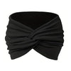 Black stretch sport headband tied in a knot for hair and workout