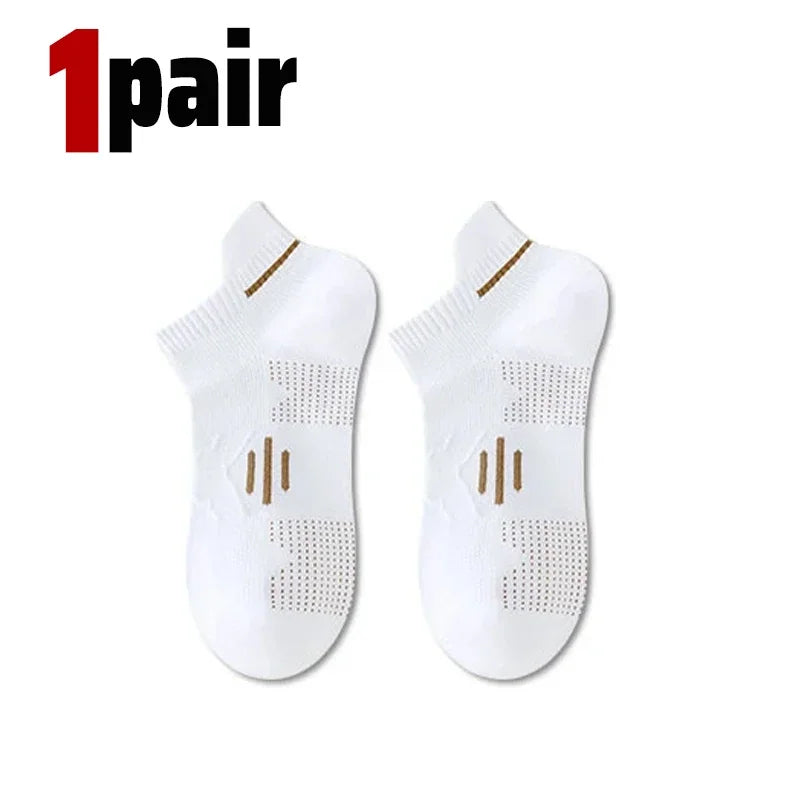 A pair of white premium breathable men's running socks shown flat.