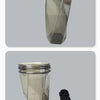 A clear plastic protein shaker bottle with a black lid and a separate mixing/dispensing piece.
