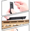 Hands installing a tactical rail panel kit onto an airsoft gun rail system.