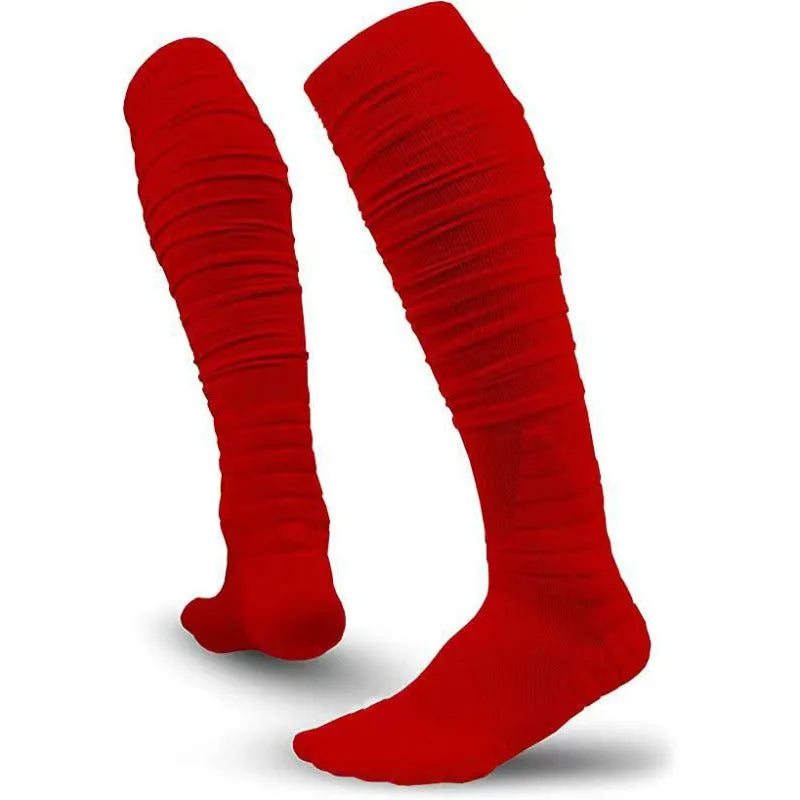 A pair of bright red extra long football socks for men shown standing vertically.