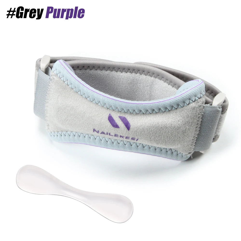 A grey purple adjustable knee strap and a white spoon are shown.