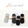A set of multi-colored breathable cotton ankle socks displayed on a white background.