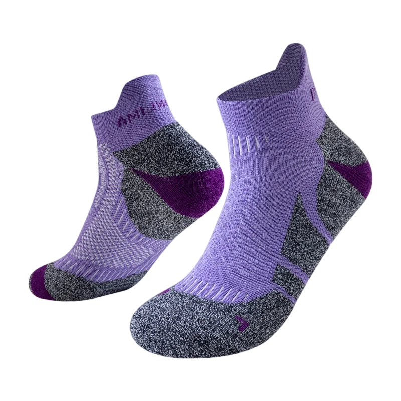 A pair of purple and gray performance sports ankle socks shown from the side.