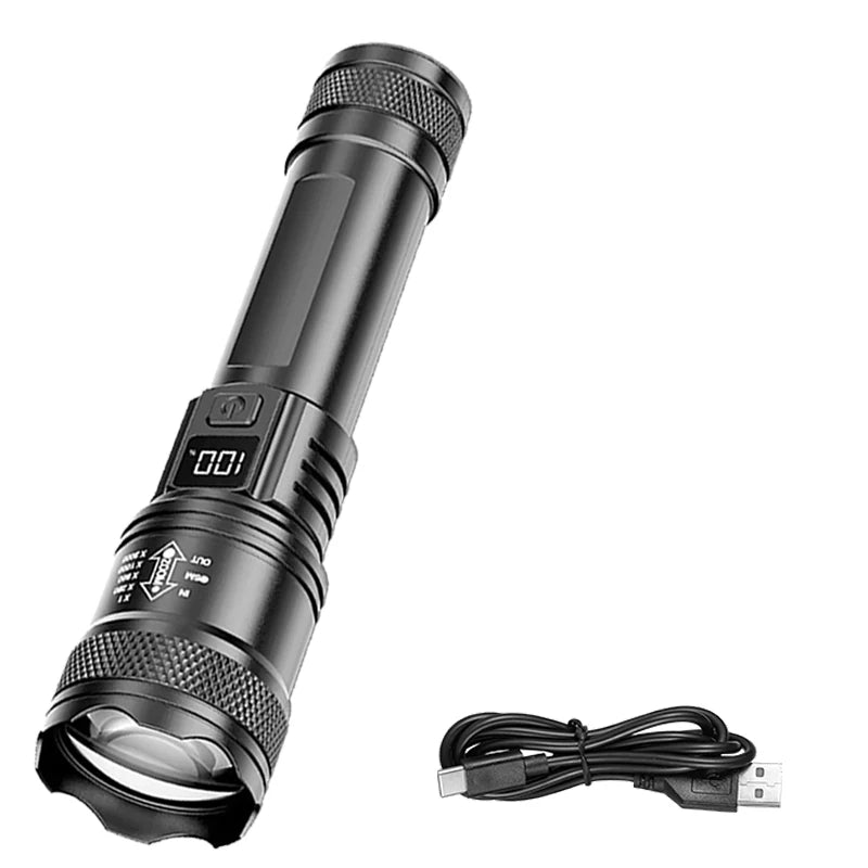 A black tactical LED flashlight with a textured lens and a detachable USB charging cable.