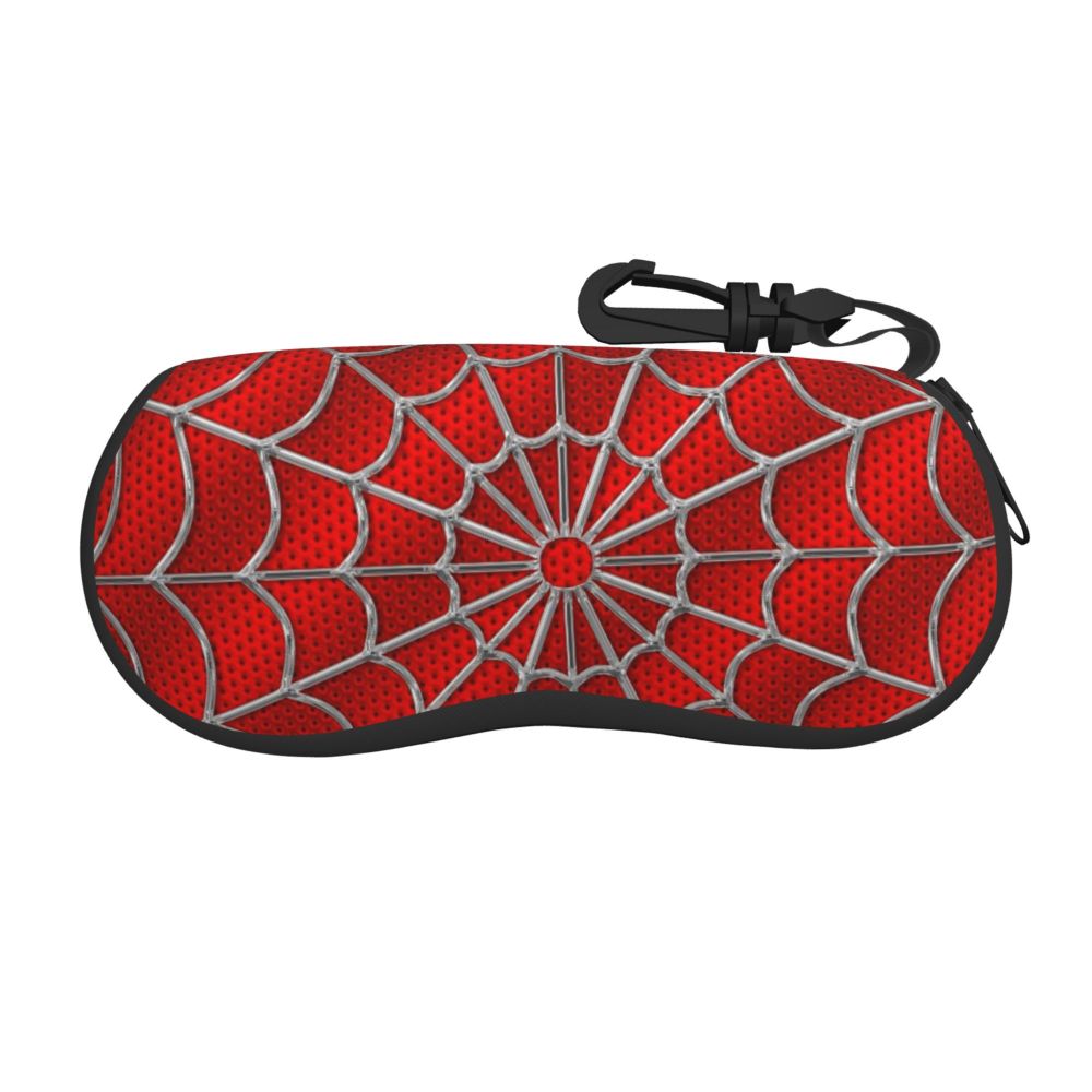 A red spider web patterned pouch designed to hold eyeglasses.