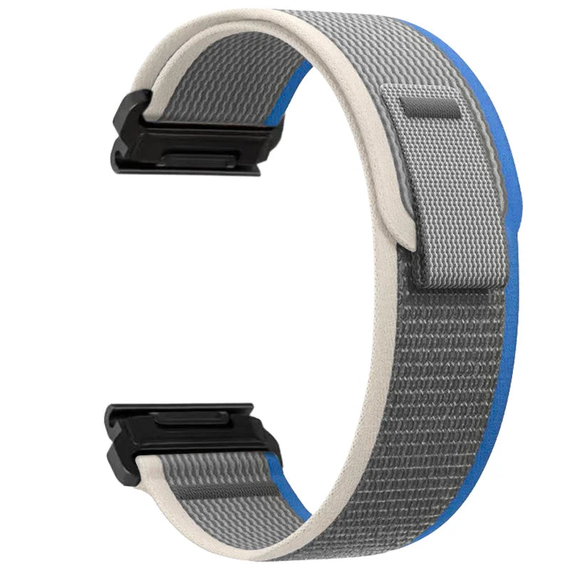 A gray and blue adjustable nylon strap for a sports watch.