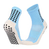 A pair of light blue performance sports grip socks shown from the side.