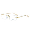 A pair of gold-framed, clear rectangular glasses with a thin metal frame and blue light blocking lenses.
