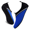 A pair of black and blue waterproof aqua socks for outdoor and beach use