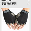 A pair of black and gray breathable half-finger sport gloves shown on a hand.