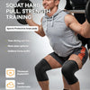 A man performing a squat with black knee sleeves and a barbell, demonstrating strength training equipment.