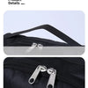 Close-up of smooth zip hardware double sliders on a black fabric shoe carrier bag