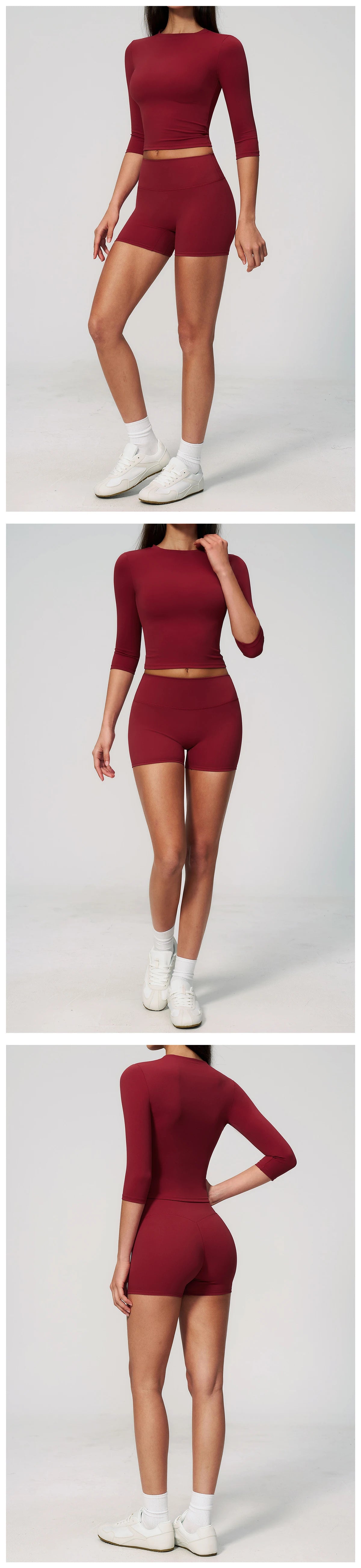 A model wearing a maroon women's yoga and fitness leggings set, featuring long sleeves and a cropped style.