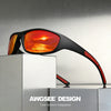 A pair of orange polarized sports sunglasses resting on a silver box.