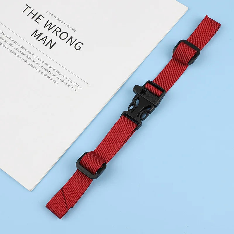 A red adjustable tactical backpack strap harness is shown against a light blue background.