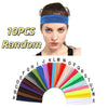 A variety of colorful stretchable cotton sweat absorbing headbands displayed in an arc.